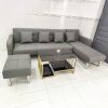 Sofa Bed Góc L Màu Xám Bọc Da Kèm Bàn Trà Kính Đen Mới 99%